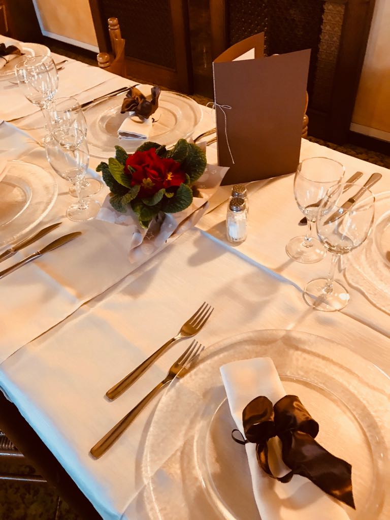 A table with plates and cutlery